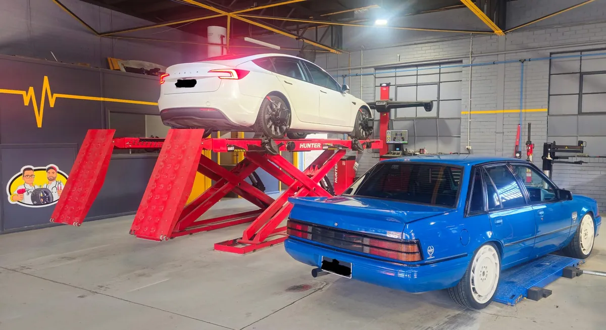 Tesla on the hoist for EV tyre fitting at Tyre Doctors Knoxfield