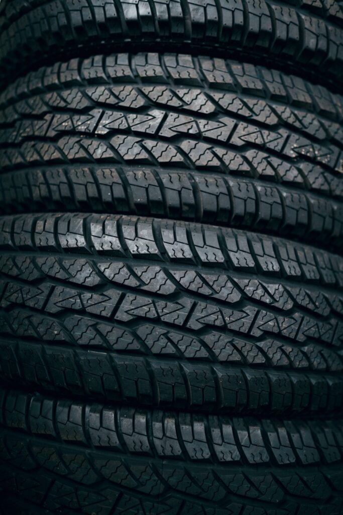 Close-up of vehicle tyres showing tread patterns